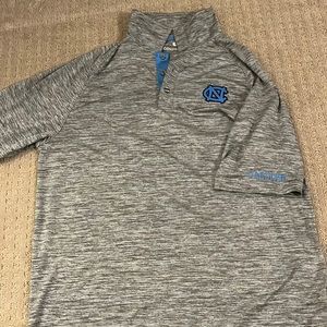 Dry fit styled UNC collared shirt. Never worn
